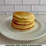 A plate with a stack of Chocolate Chip Pancakes and the Healthy Mom Healthy Family Logo.
