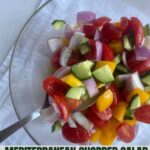 A bowl of Chopped Mediterranean Salad with Healthy Mom Healthy Family logo.