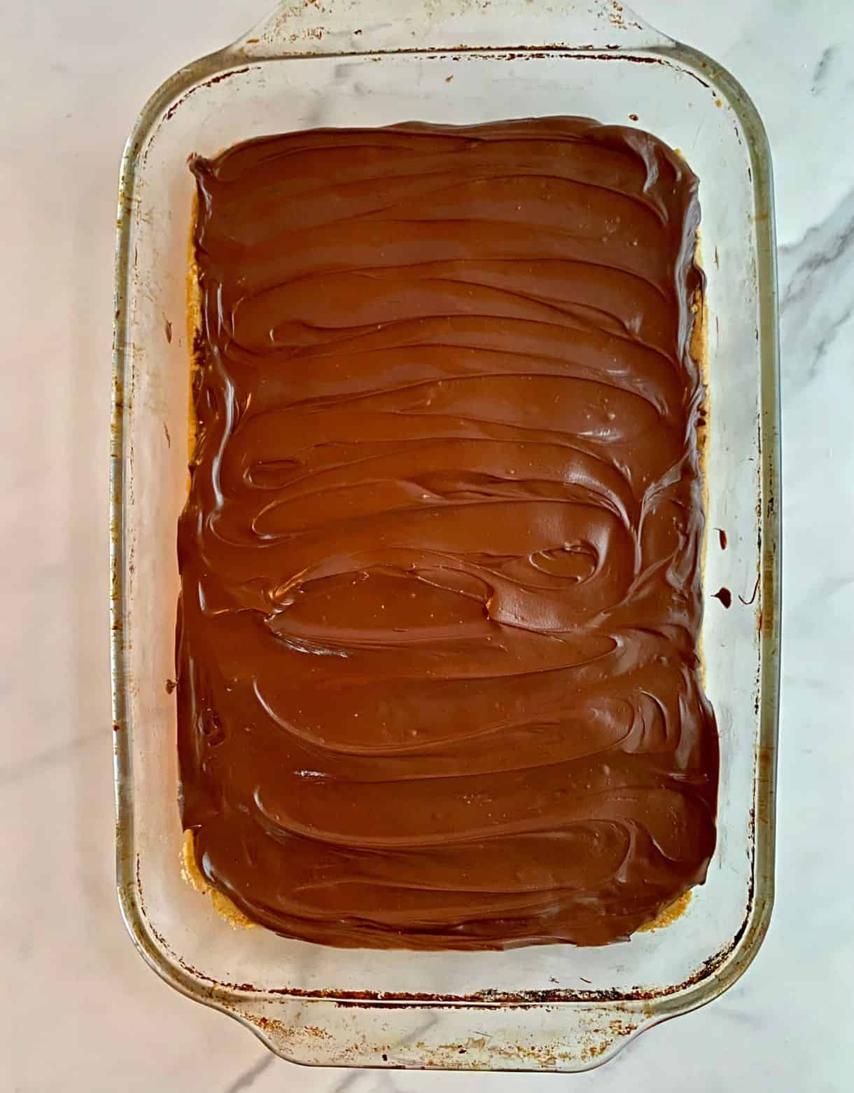 A pan of No-Bake Chocolate Peanut Butter Bars not cut up yet.