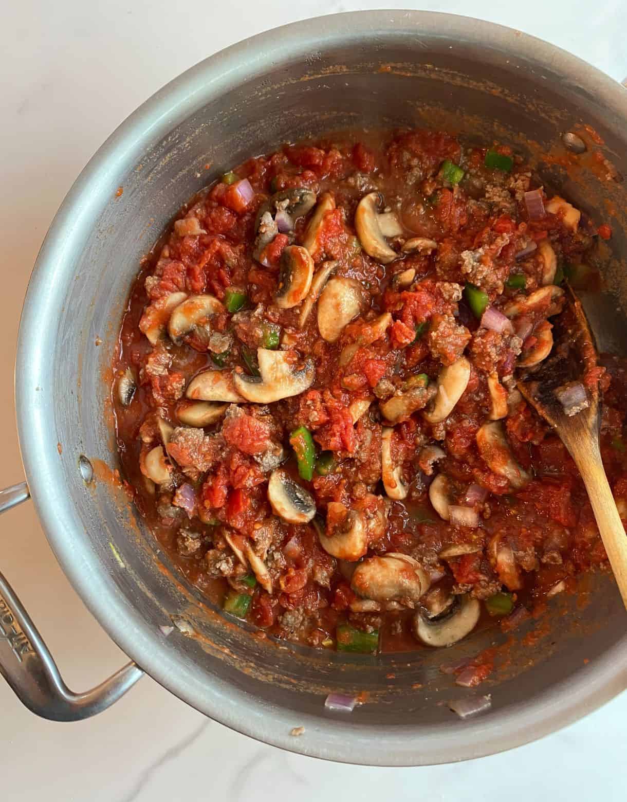 A pot will Pizza Bowl filling.