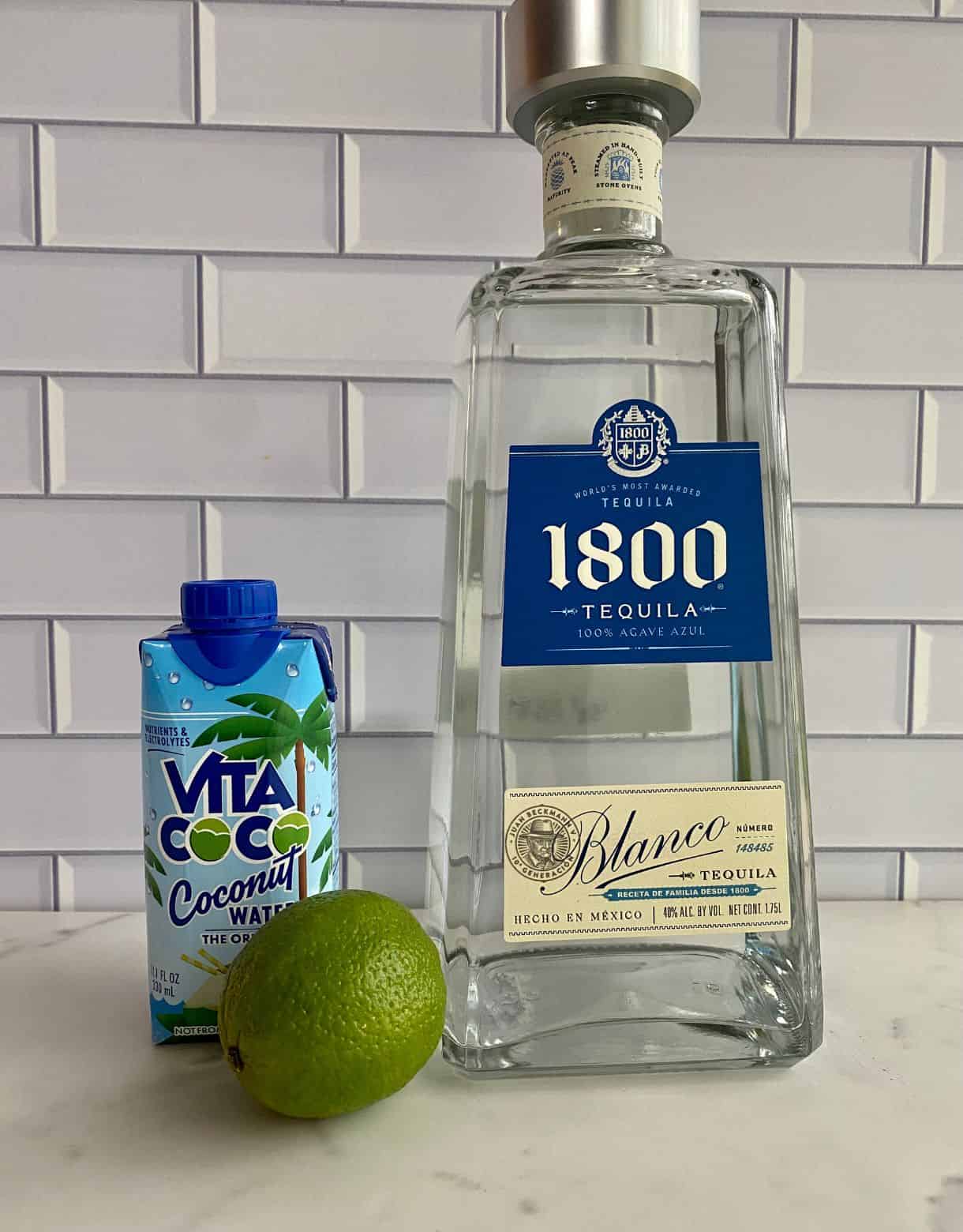 Silver tequila, coconut water and a lime.