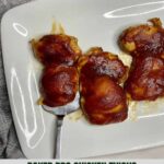 A platter with cooked Baked BBQ Chicken Thighs and the Healthy Mom Healthy Family logo.