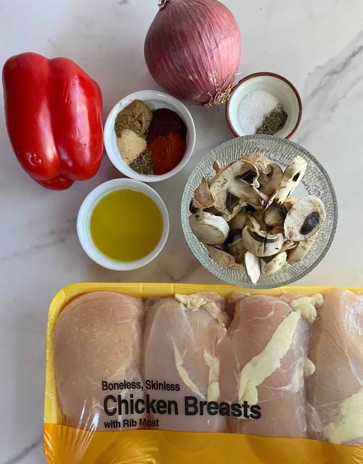 Chicken breasts, mushrooms, bell pepper, onion, olive oil and spices.