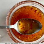 A bowl of Sweet Chili Sauce with a spoon and the Healthy Mom Healthy Family logo.