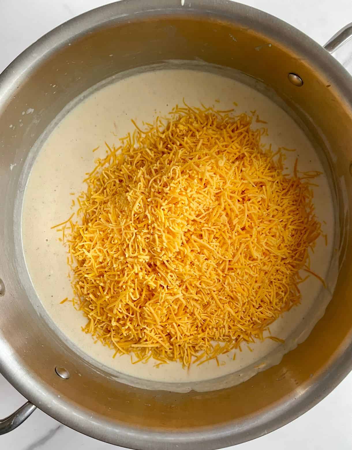 A pan of cheese sauce.