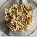 A bowl of shredded chicken.