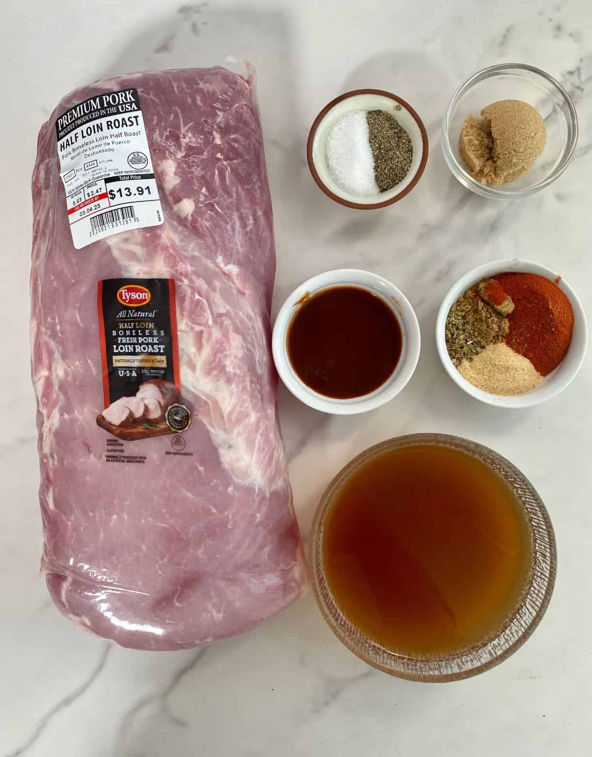 Ingredients for Pork Loin Carnitas. Pork loin, chicken broth, liquid smoke, brown sugar and spices.