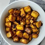 A bowl of cooked Sesame Tofu.