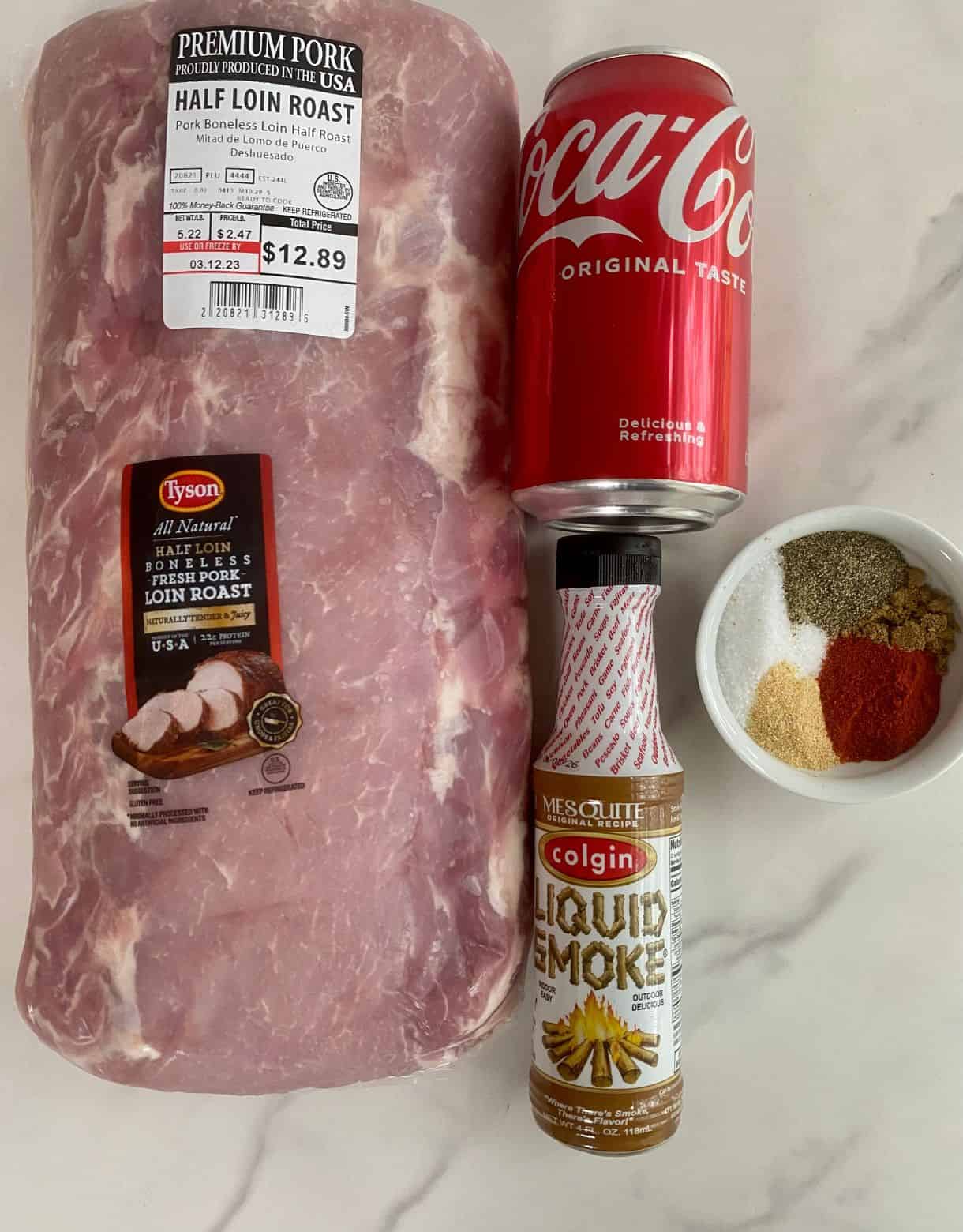 Ingredients for Coca Cola puled pork. Pork loin, coke, liquid smoke and spices.