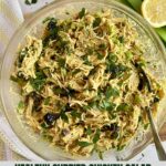 A bowl of Healthy Curried Chicken Salad all mixed together.
