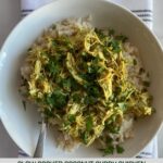 A bowl of Slow Cooker Curry with Coconut Milk over cauliflower rice.