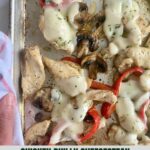 A sheet pan with cooked Chicken Philly Cheesesteak.