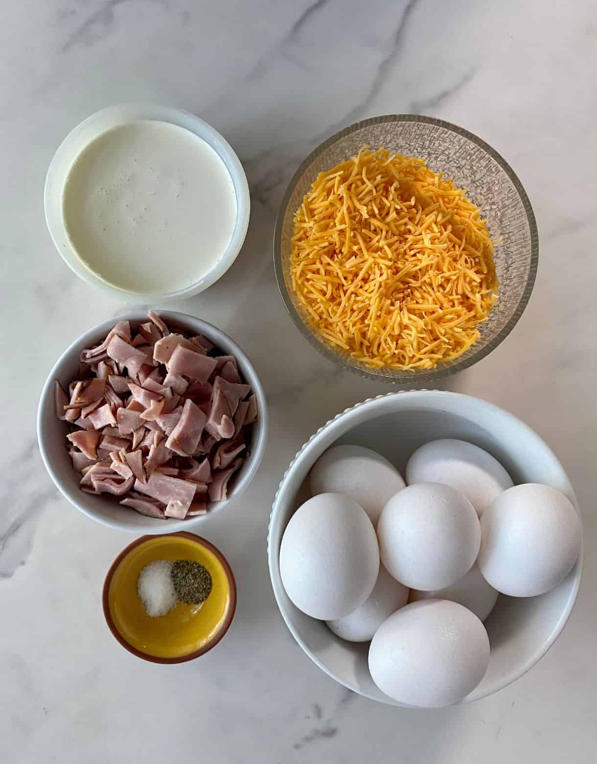 Ham, cheddar cheese, eggs, heavy cream, salt and pepper.