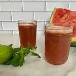 Two glasses of watermelon and cucumber juice.