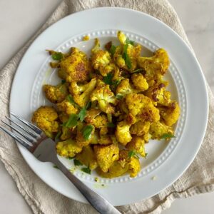 A plate of cooked Indian Roasted Cauliflower.