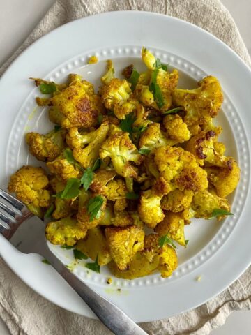A plate of cooked Indian Roasted Cauliflower.