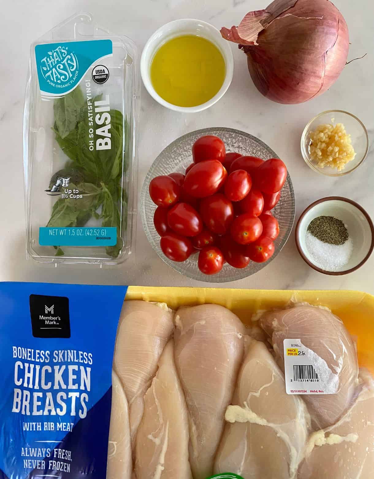 Chicken breasts, grape tomatoes, fresh basil, olive oil, red onion, minced garlic, salt and pepper.