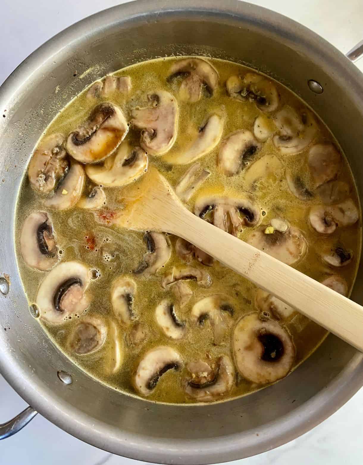 A pot of simmering soup.