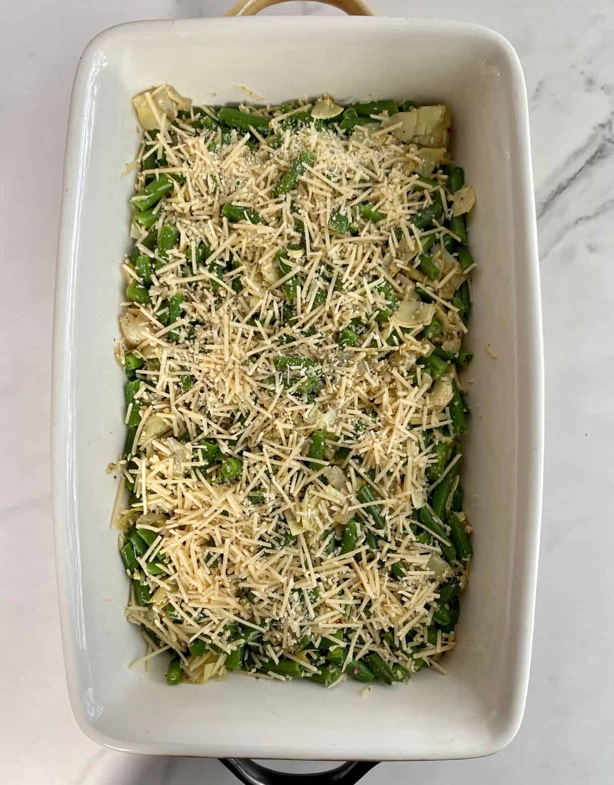 An un-baked Green Bean Artichoke Casserole ready to go in the oven.