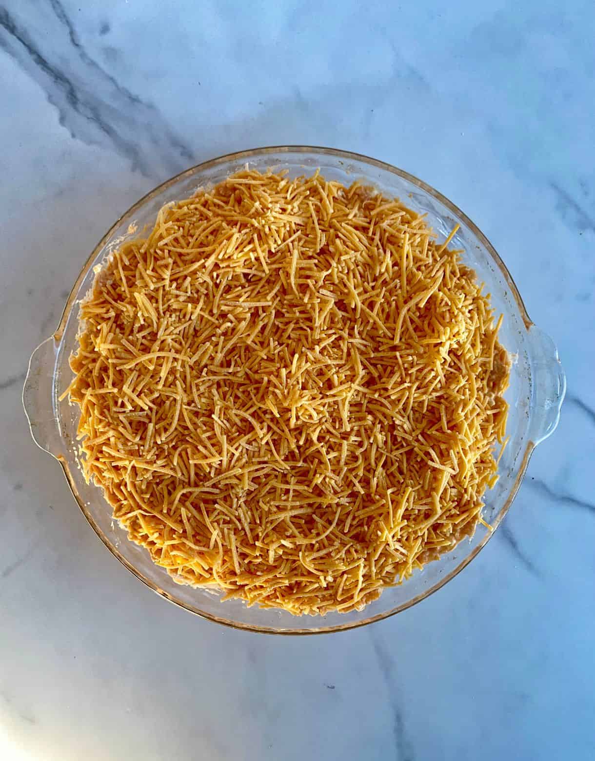 A dish of unbaked Cottage Cheese Buffalo Chicken Dip.