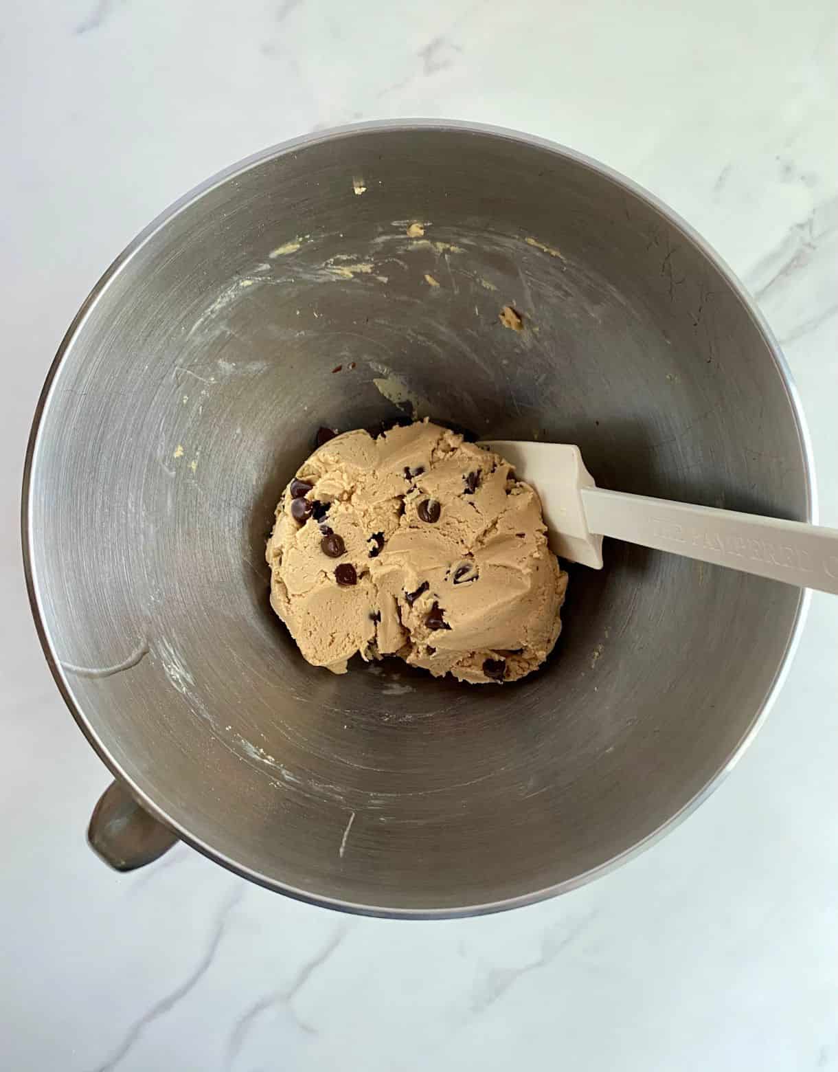 A mixing bowl with mixed batter.