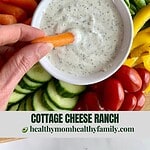 A bowl of Cottage Cheese Ranch surrounded by veggies.