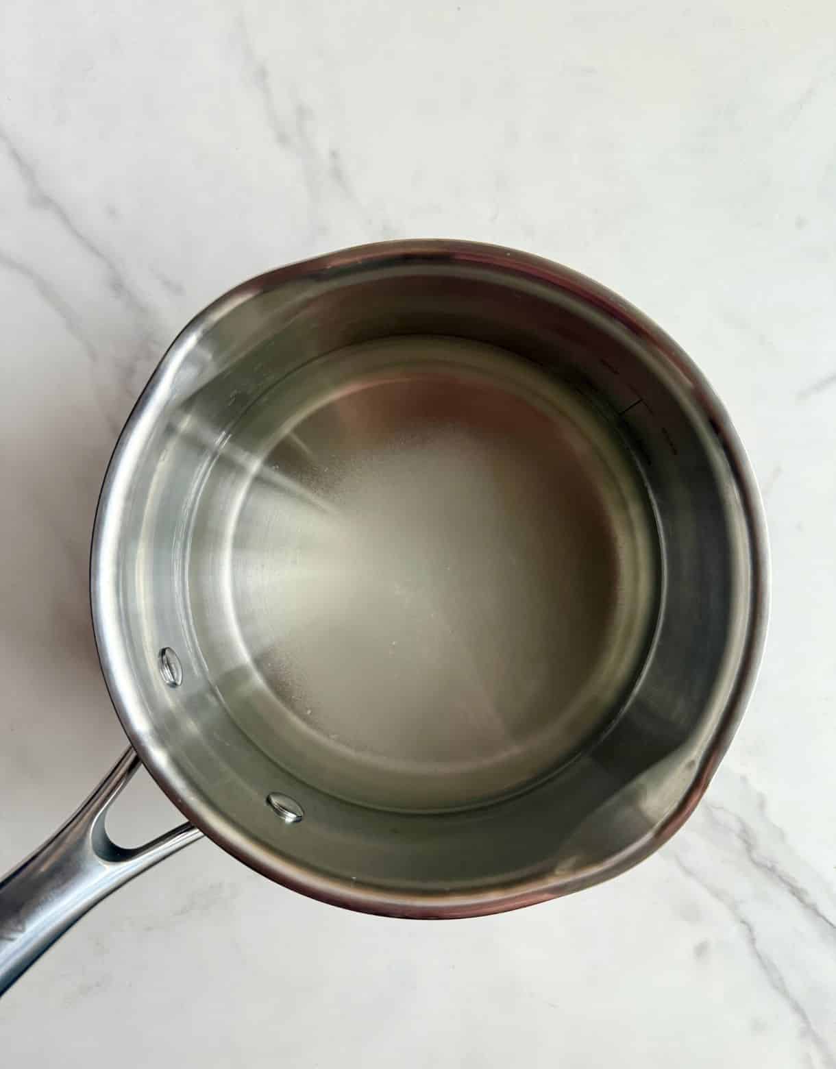 A pot of water with sugar substitute added.